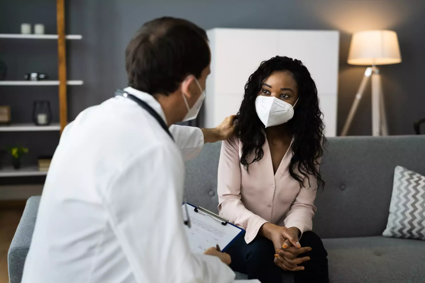 Image of doctor and patient having conversation.